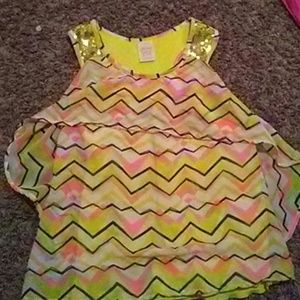 A colorful yellow black and orange tank top!
